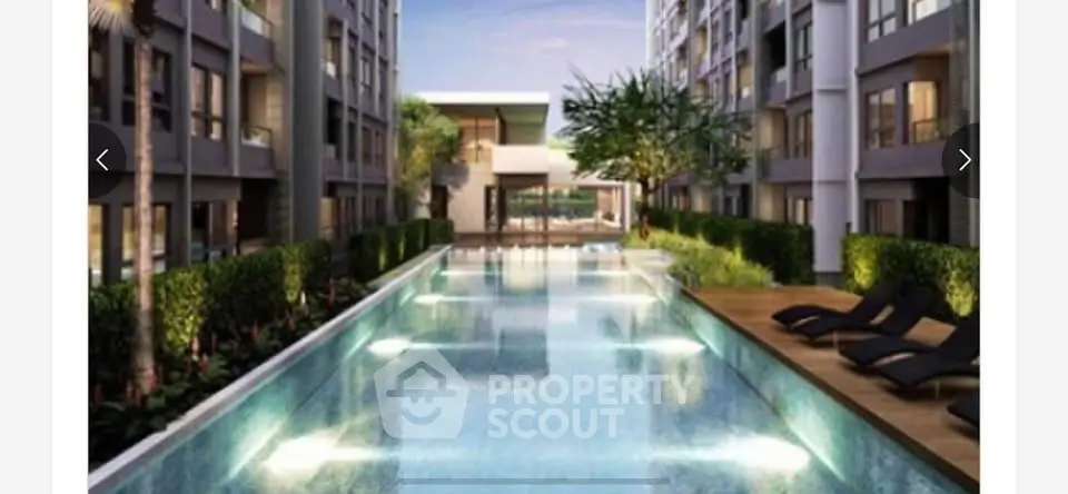 Luxurious apartment complex with a stunning outdoor pool and modern architecture.