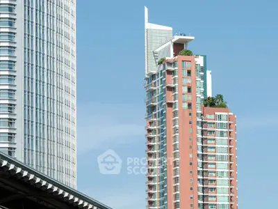 Stunning modern high-rise buildings with unique architectural design and lush greenery.