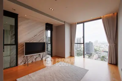 Spacious modern living room with panoramic city view and stylish decor