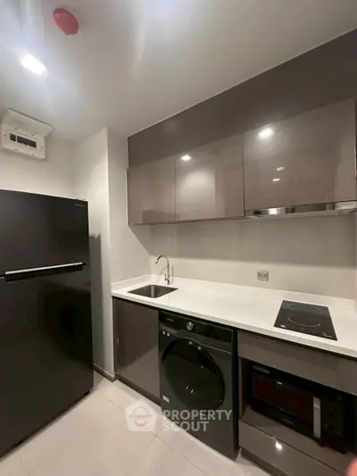 Modern kitchen with sleek appliances and minimalist design