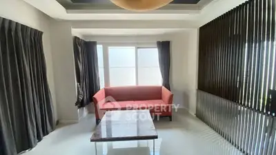 Spacious living room with modern design and natural light