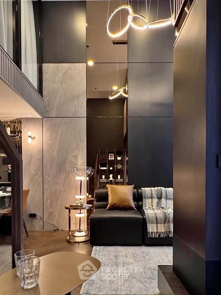 Luxurious modern living room with high ceilings and elegant lighting