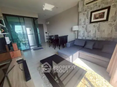 Modern living room with stylish decor and ample natural light