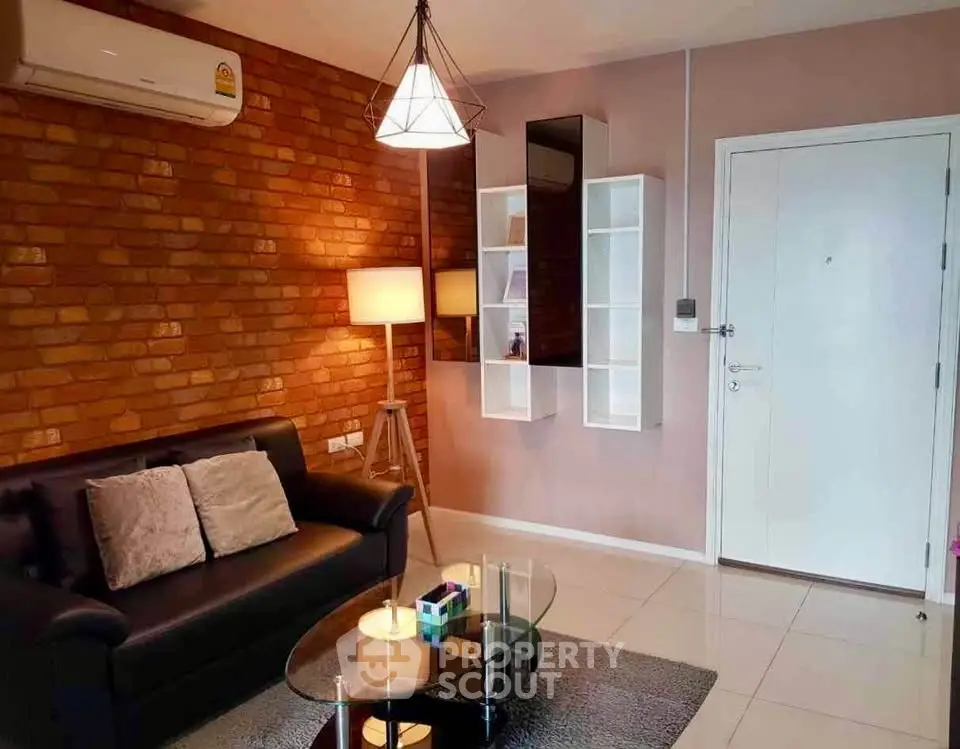 Stylish living room with exposed brick wall and modern decor