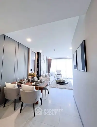 Modern living room with elegant dining area and natural light