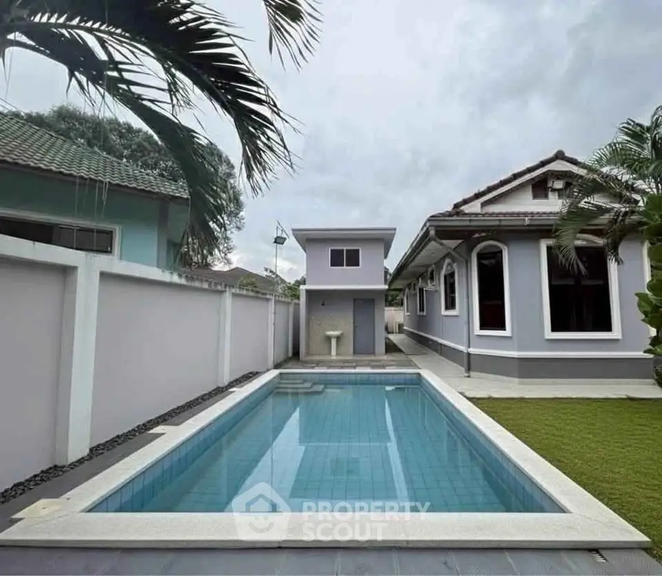 Charming suburban home with private pool and lush garden, perfect for relaxation and family gatherings.