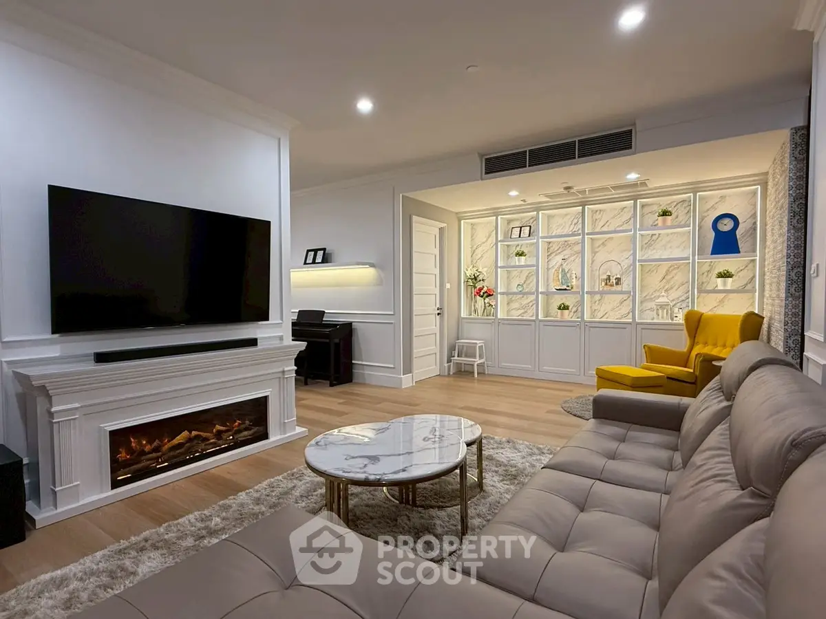 Luxurious living room with modern fireplace and elegant decor