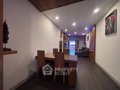 Modern living room with elegant dining area and stylish decor