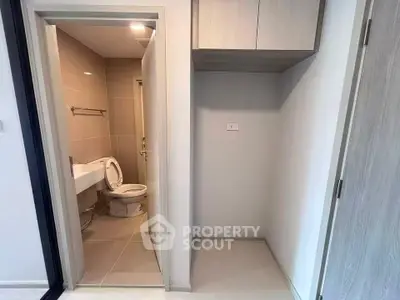 Modern bathroom with sleek design and compact storage space