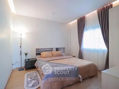 Cozy and bright bedroom with modern decor and natural light