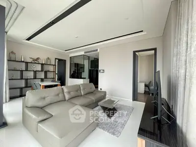 Modern living room with sleek furniture and open layout, perfect for contemporary living.
