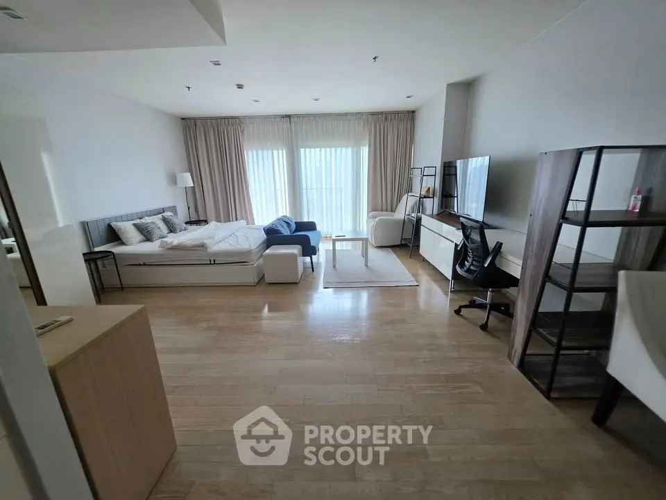 Spacious modern living room with stylish furniture and natural light
