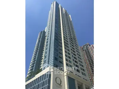 Stunning high-rise building with modern architecture and expansive city views.