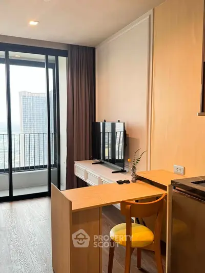 Modern living room with balcony view in high-rise apartment
