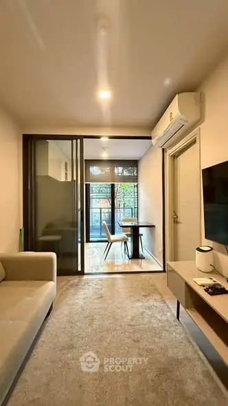 Modern living room with air conditioning and stylish decor