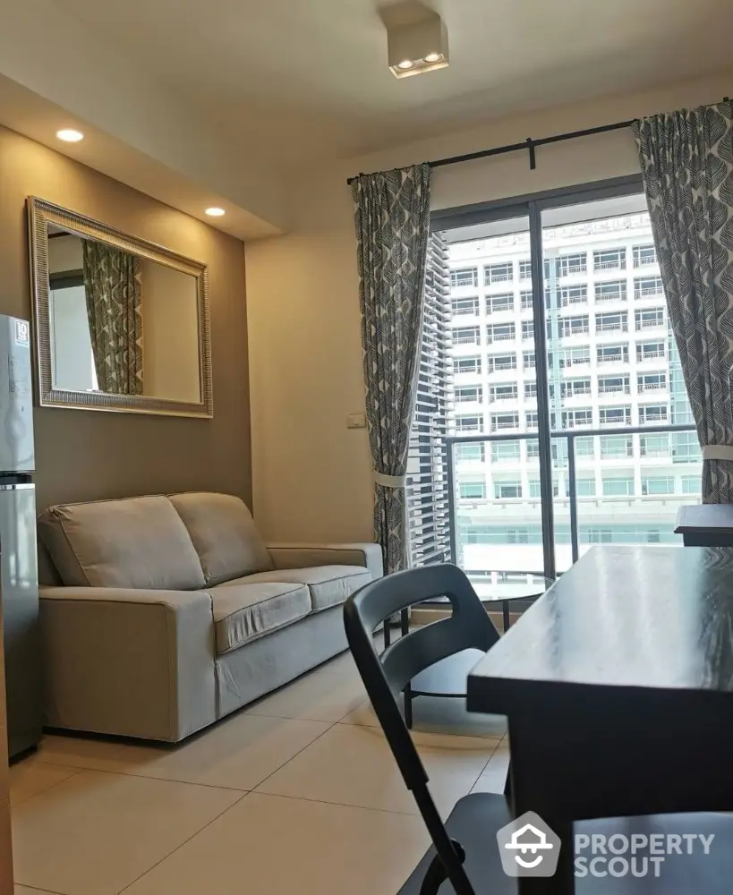 Modern living room with balcony view in urban apartment