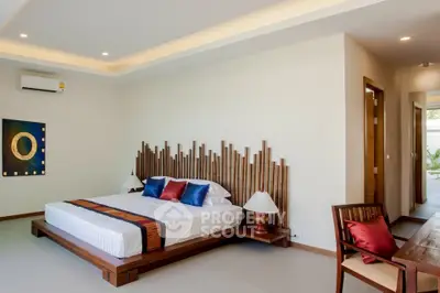Luxurious modern bedroom with unique wooden headboard and stylish decor