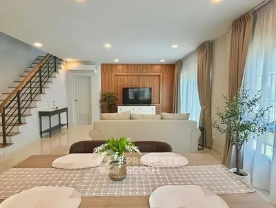 Spacious modern living room with elegant decor and natural light