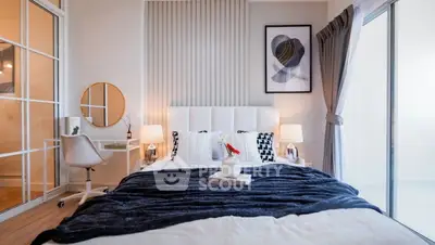 Modern bedroom with stylish decor and natural light