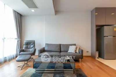 Modern living room with sleek furniture and natural light