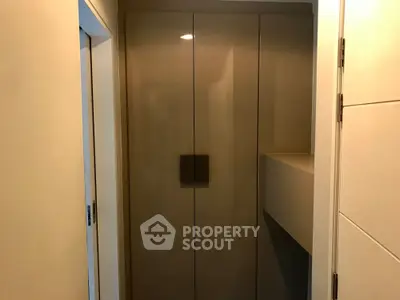 Modern storage space with sleek cabinetry and minimalist design.