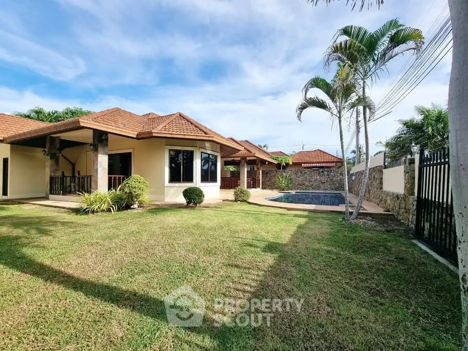 Charming single-story home with spacious garden and private pool, perfect for family living.