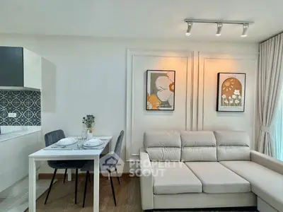 Modern living room with elegant decor and cozy dining area