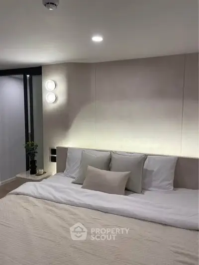 Modern bedroom with cozy lighting and elegant decor