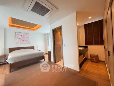 Luxurious bedroom with modern design and ambient lighting