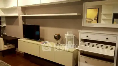 Modern living room with sleek TV unit and stylish decor