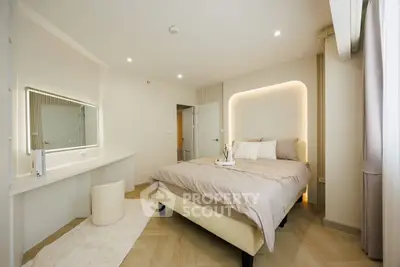 Elegant modern bedroom with cozy lighting and stylish decor