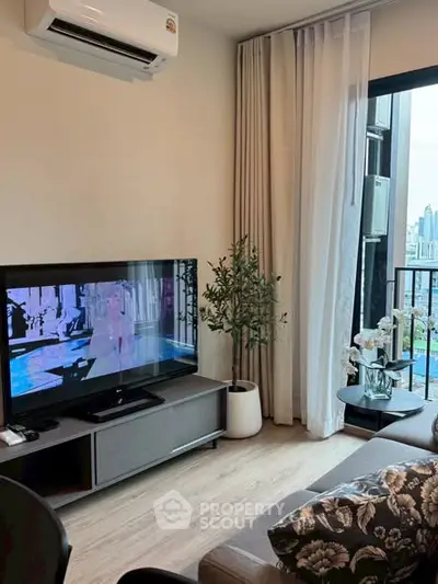 Modern living room with city view, air conditioning, and stylish decor