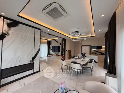 Luxurious modern living room with marble accents and stylish lighting