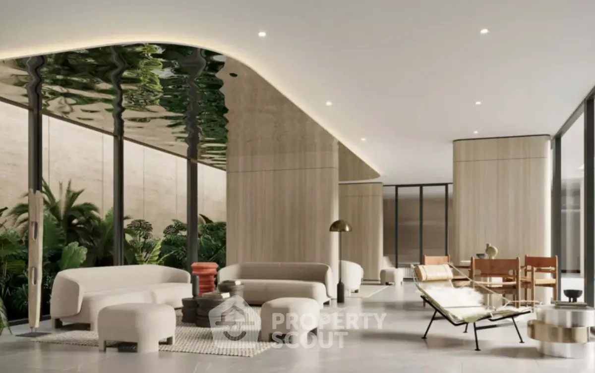 Luxurious modern living room with elegant furniture and floor-to-ceiling windows overlooking lush greenery.