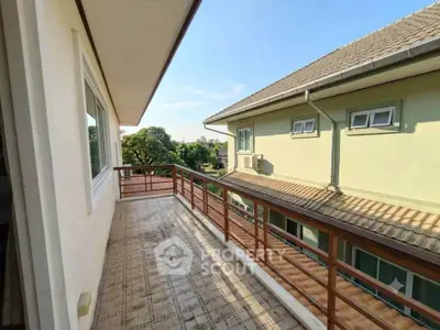 Spacious balcony with scenic view in modern residential building