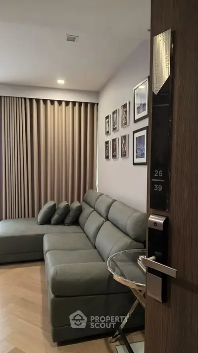Modern living room with stylish decor and comfortable seating in a contemporary apartment.