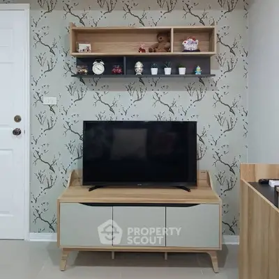 Stylish living room with modern TV stand and decorative shelving