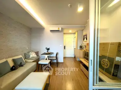 Modern living room with stylish decor and wooden flooring