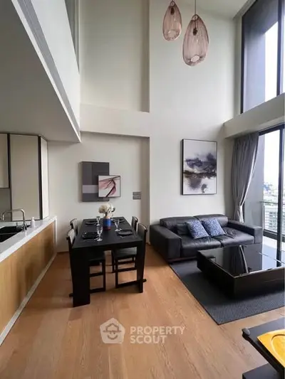 Luxurious modern living room with high ceilings and elegant decor