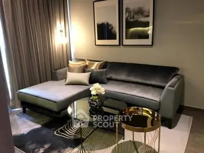 Stylish modern living room with elegant gray sofa and chic decor