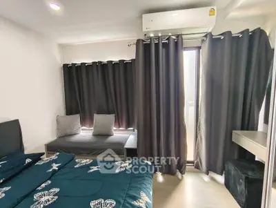 Cozy bedroom with modern decor and natural light from large window