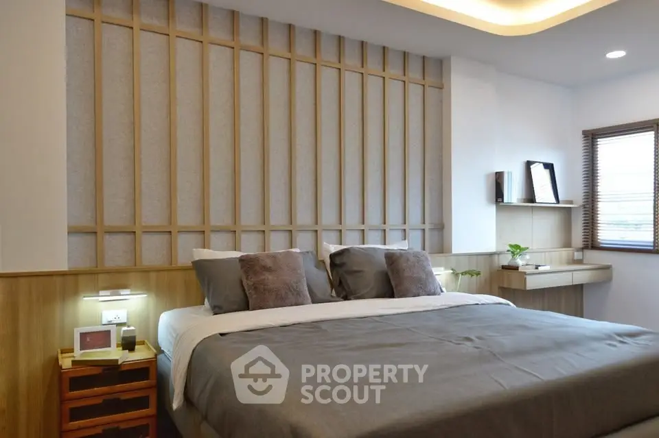 Modern bedroom with stylish decor and cozy ambiance