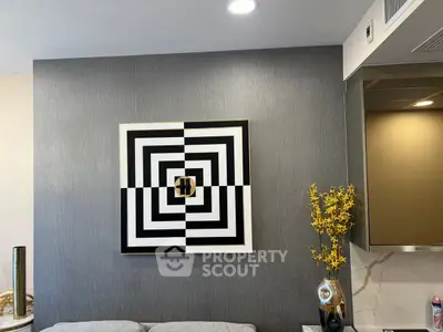 Stylish modern living room with geometric art and elegant decor