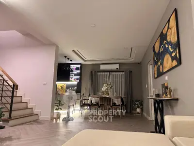 Modern living room with elegant dining area and stylish decor
