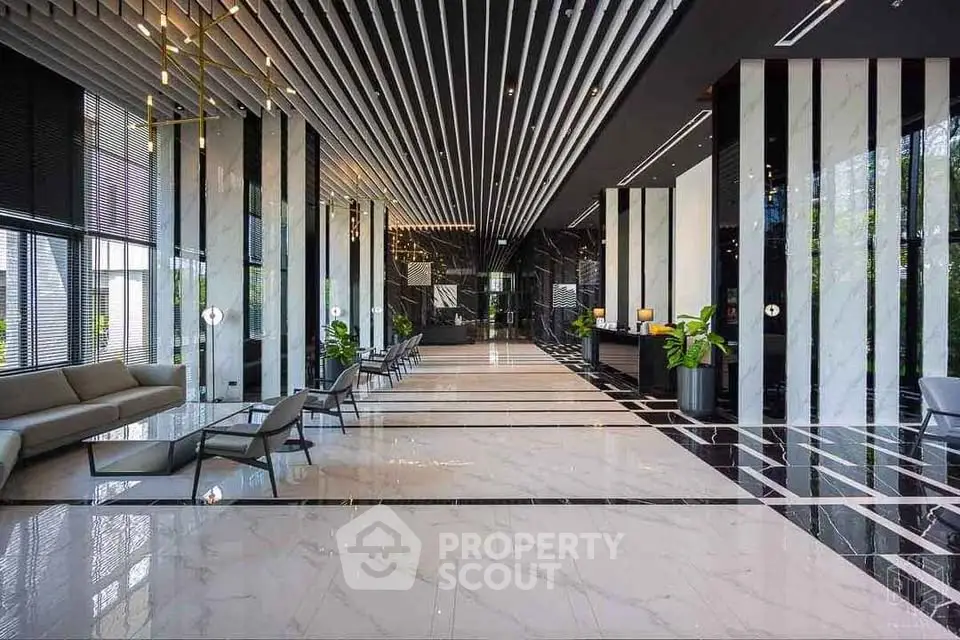 Luxurious modern building entrance with sleek design and elegant decor