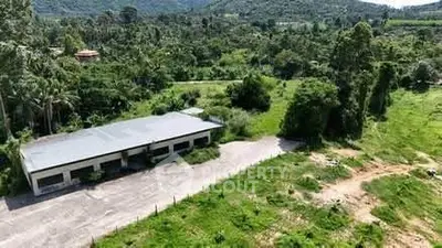 Scenic rural property with lush greenery and spacious surroundings