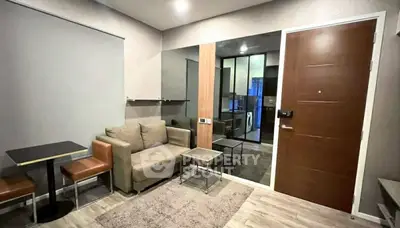 Modern living room with cozy sofa and dining area in stylish apartment