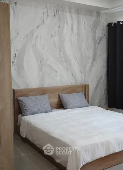 Modern bedroom with stylish wood bed frame and marble accent wall