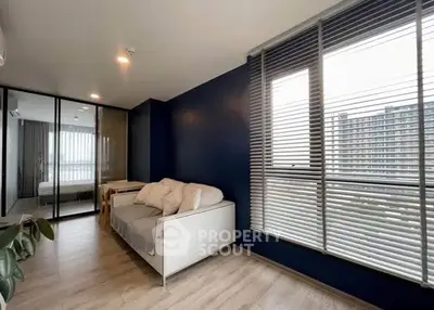 Modern living room with city view and stylish decor