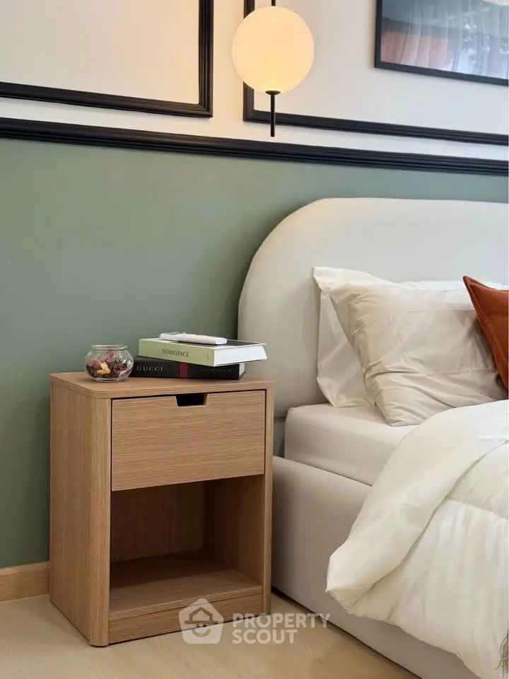Modern bedroom with stylish nightstand and cozy bed setup